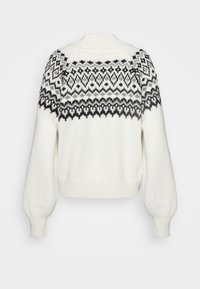 Weißer gestrickter Pullover mit einem gemusterten schwarzen Einsatz und geometrischen Designs. Runder Halsausschnitt, überschnittene Schultern und gerippte Manschetten.