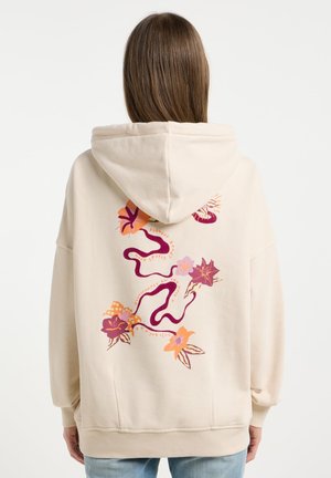 Cremfarbener Hoodie mit Kapuze und Kordelzug, der auf der Rückseite mit bunten floralen und abstrakten Grafiken verziert ist und einen lässigen Schnitt hat.