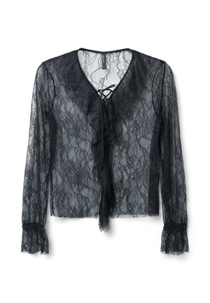 Blusa nera in pizzo con maniche lunghe, dettaglio arricciato sul davanti e chiusura a fiocco al collo. Tessuto testurizzato con sezioni trasparenti e polsini svasati.