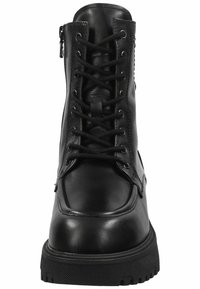 Black leather ankle boot featuring laces, a side zipper, a solid toe cap, and a rugged rubber sole with textured tread.