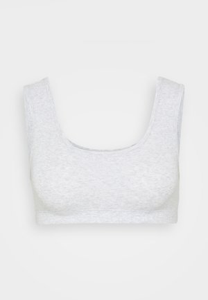 Gray cotton bralette with a scoop neckline and wide straps, featuring a smooth texture and a seamless design without fasteners.