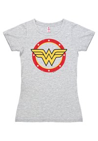 Gray cotton t-shirt with a fitted design. Features a central circular Wonder Woman logo in red, yellow, and white with star accents.