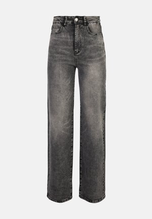 Kõrge vöökohaga mustad denimitõmblusega laiade säärtega teksad, mis on kulunud viimistlusega, ees taskud, vööaasad ja üks metallist nööp.