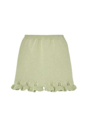 Jupe en maille vert clair avec ceinture côtelée et ourlet à volants avec de petits détails en maille ajourée.