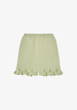 Jupe en maille vert clair avec ceinture côtelée et ourlet à volants avec de petits détails en maille ajourée.