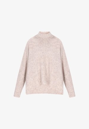 Beige, magas nyakú kötött pulóver hosszú ujjakkal, bordázott mandzsettával, szegéllyel és nyakkivágással, fehér háttér előtt bemutatva.