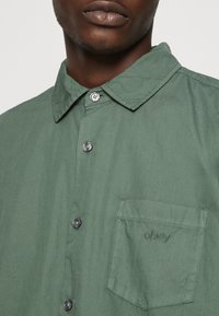 Obey Clothing PIGMENT SULLY UNISEX - Blusa - laurel wreath
