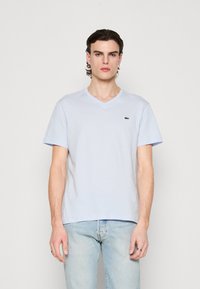 Lacoste Basic póló - bleu clair