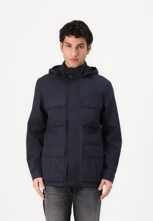Marineblauwe hoodie-jack met vier voorzakken, knoopsluitingen en een lichtgewicht, textuurstof. Verstelbare capuchon voor een goede pasvorm.