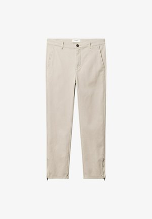 Beige slim-fit broek met zijzakken, lussen voor een riem, knoopsluiting en ritsen aan de zoom bij de enkels.