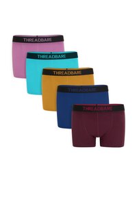 Cinco pares de calzoncillos bóxer en varios colores: morado, verde azulado, amarillo mostaza, azul marino y burdeos. Cada uno tiene una pretina negra contrastante con el texto "THREADBARE".