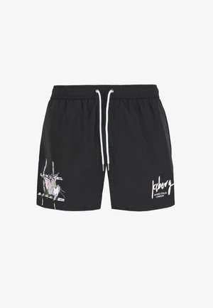 Pantaloni da bagno neri realizzati in tessuto leggero, con un design di un gatto illustrato a sinistra e lacci bianchi per la regolazione.