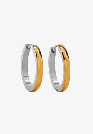 Kolczyki koła o dwukolorowym designie, polerowane w srebrnym i złotym odcieniu, w kształcie koła i gładkiej fakturze.
