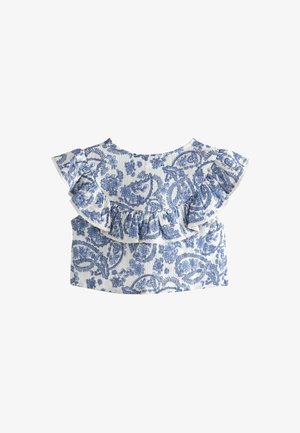 Haut à motifs floraux bleu et blanc avec des manches volantes et un design cropped, fabriqué dans un tissu léger à l'apparence texturée.