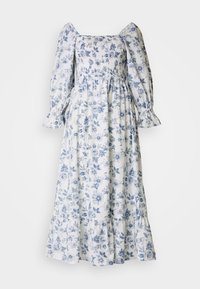 Vit blommig klänning med blå mönster, som har puffärmar, fyrkantig halsringning, smockad byst och en volangkjol. Tillverkad av lättviktig tyg.