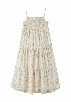 Robe sans manches couleur crème avec bretelles fines, corsage froncé, jupe à volants, et petit motif floral rose, violet et bleu.