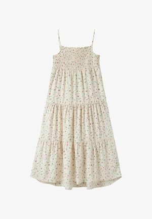 Robe sans manches couleur crème avec bretelles fines, corsage froncé, jupe à volants, et petit motif floral rose, violet et bleu.