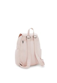 Pink backpack with textured fabric, featuring adjustable straps, a top handle, and a zippered pocket on the back. Simple design.