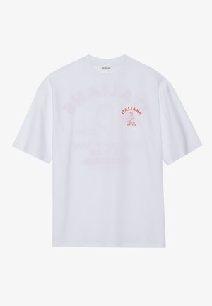 White cotton t-shirt with a crew neck, featuring red graphic text "ITALIANS DO IT BETTER" and an outline design. Relaxed fit, short sleeves.
