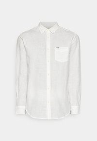 Selezionato, worn white