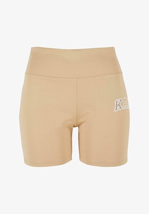Shorts beige a vita alta realizzati in tessuto elasticizzato, con una texture liscia e grafica bianca "KAR" sul lato sinistro.