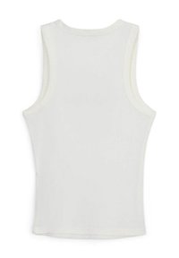 Top a maniche corte bianco a coste con scollatura rotonda. Presenta una texture liscia e un design aderente, adatto per essere indossato a strati o per look casual.