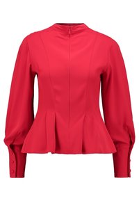 Peplum-bluse i klar rød, glat stof, høj hals, lange ærmer med knapdetaljer og lynlås bagpå til lukning.