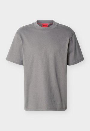 Grey short-sleeve crew neck T-shirt with subtle "HUGO" logo centered on chest and red brand label inside collar.