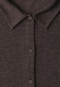 Dark brown knit fabric with a pointed collar and three matching brown buttons down the front of the garment.