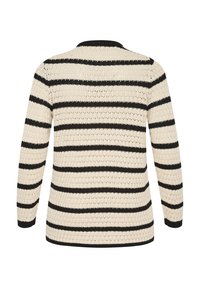 Striped knit sweater in cream and black, with a loose fit, long sleeves, and ribbed neckline and hem. Features an openwork texture.