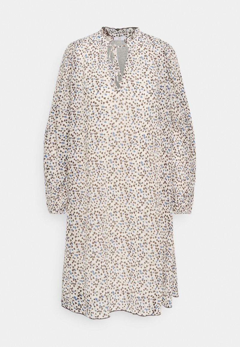 Robe ample à manches longues longueur genou avec fond beige clair et petites taches abstraites marron et bleues, col à volants et col à nouer.
