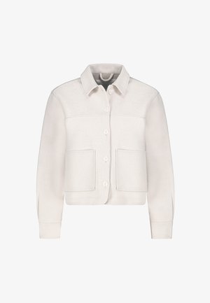 Cream-colored cropped jacket in soft fabric with a collar, button front, and two large front pockets. Simple design with long sleeves.