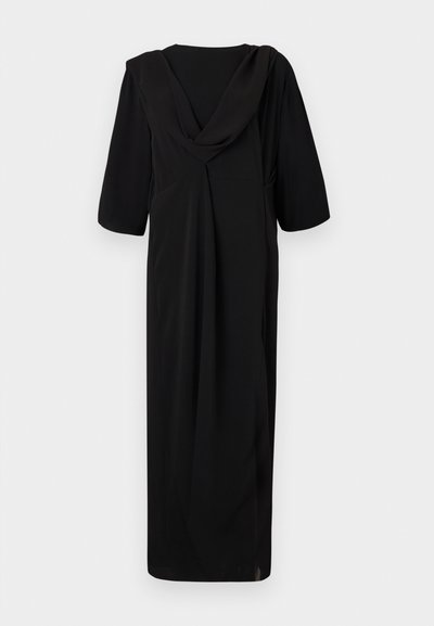 Black, knee-length dress with a draped back, short sleeves, and a relaxed fit. Made of smooth fabric, featuring subtle stitching details.