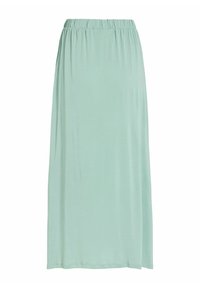 Gaiši zaļa maksi svārki ar elastīgu jostasvietu, mīkstu audumu un vienkāršu, taisnu siluetu.