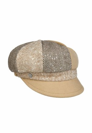 Patchwork brown and beige wool flat cap with a short brim and textured herringbone and tweed patterns.