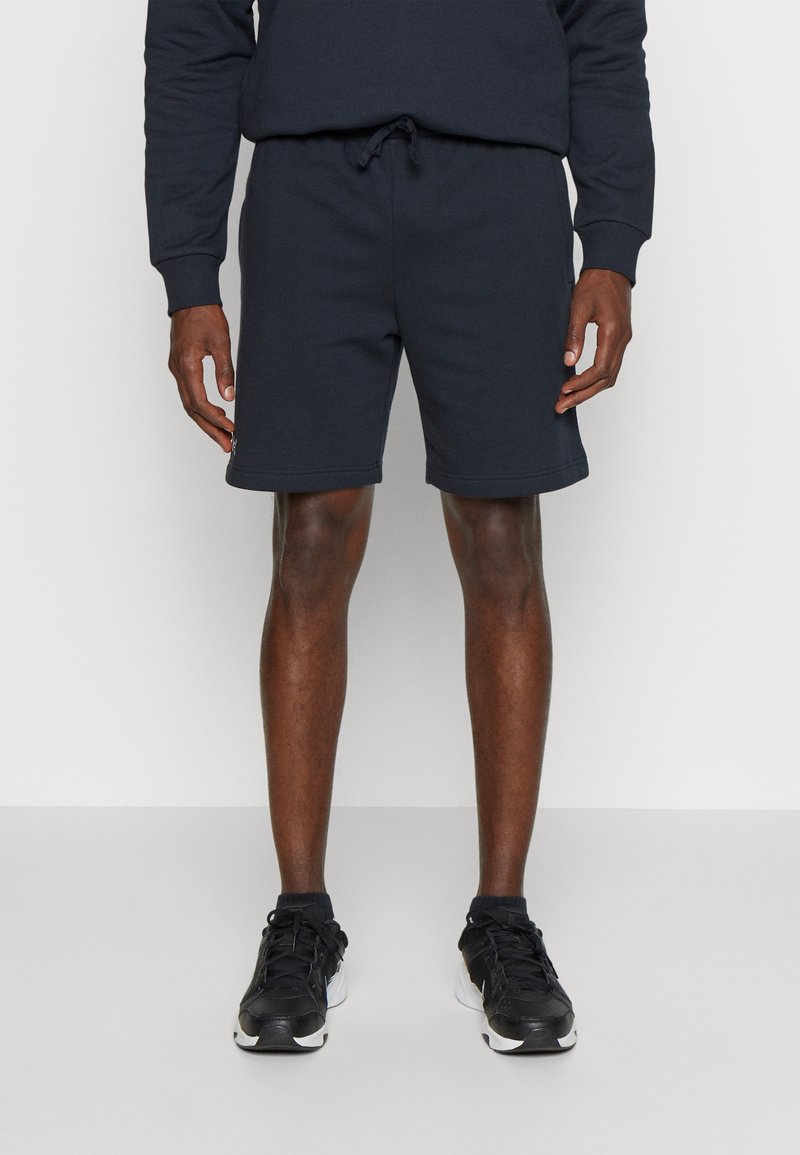 Under Armour RIVAL FLEECE - Sports shorts - black/white