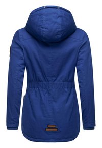 Blue hooded jacket with a cinched waist, ribbed cuffs, and brown logo patches at the lower back and sleeve. Smooth fabric texture.