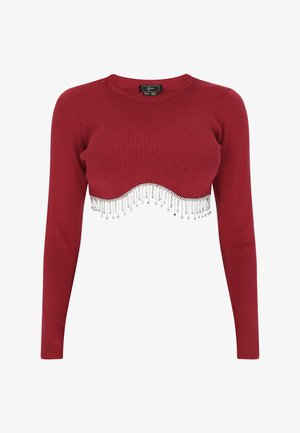 Rode geribbelde crop top met lange mouwen, voorzien van een golvende zoom versierd met zilveren kraalfranje voor extra detail.