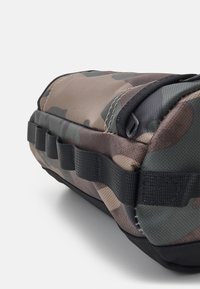 The North Face TRAVEL CANISTER - Estojo - kelp tan/black