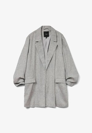 Blazer grigio oversize realizzato in tessuto testurizzato, con colletto a risvolto, maniche lunghe e due tasche frontali, dal taglio dritto.