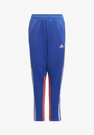 Pantaloni sportivi blu realizzati in tessuto morbido, con pannelli laterali rossi, strisce bianche e logo adidas sul fianco sinistro. Vita elastica.