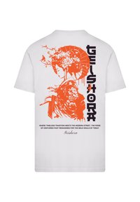 White t-shirt featuring an orange graphic design of a geisha and text. The print includes intricate details and vibrant colors.