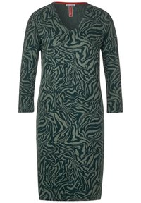 Green dress with a V-neck and long sleeves, featuring a textured black and light green zebra stripe pattern. Made of soft fabric.