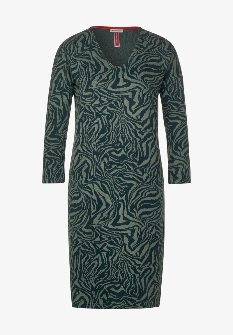 Green dress with a V-neck and long sleeves, featuring a textured black and light green zebra stripe pattern. Made of soft fabric.