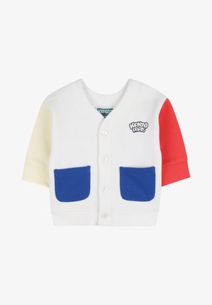 Cardigan blanc pour tout-petit avec une manche gauche jaune, une manche droite rouge, deux poches avant bleues, des boutons blancs, et le logo "Kenzo Paris" sur la poitrine.