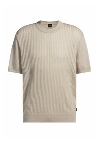Light beige short-sleeve knitted sweater featuring ribbed texture, round neckline, and a small logo tag on the side.