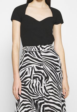 T-shirt med print - black