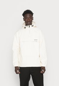 Carhartt WIP Corta-vento - beige