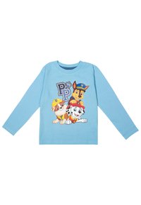 Camicetta a maniche lunghe di colore blu chiaro realizzata in cotone, caratterizzata da una grafica che rappresenta tre cani dei cartoni animati di colori e accessori diversi.
