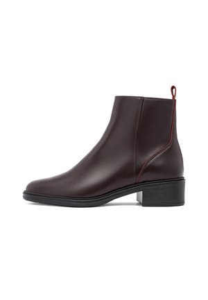 Dark brown leather ankle boot with low block heel, rounded toe, and red pull tab at back.